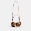 Ashton skulderveske i hårkalv med ku-mønster