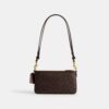 Audrey-crossbody-veske i Signature Canvas