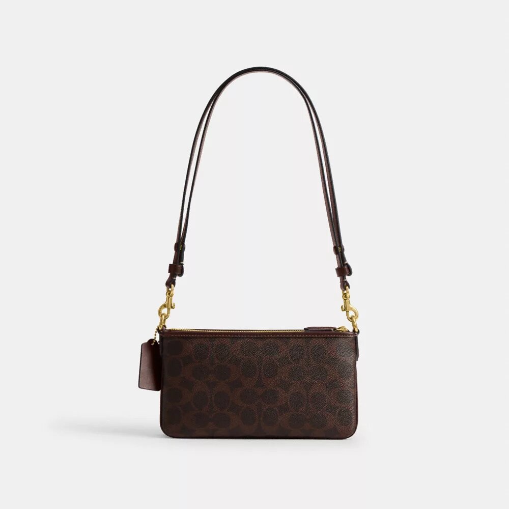 Audrey-crossbody-veske i Signature Canvas
