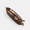 Audrey-crossbody-veske i Signature Canvas