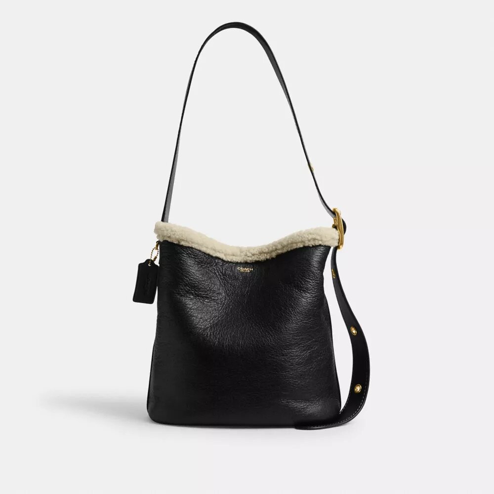 Bleecker-bucketveske i shearling