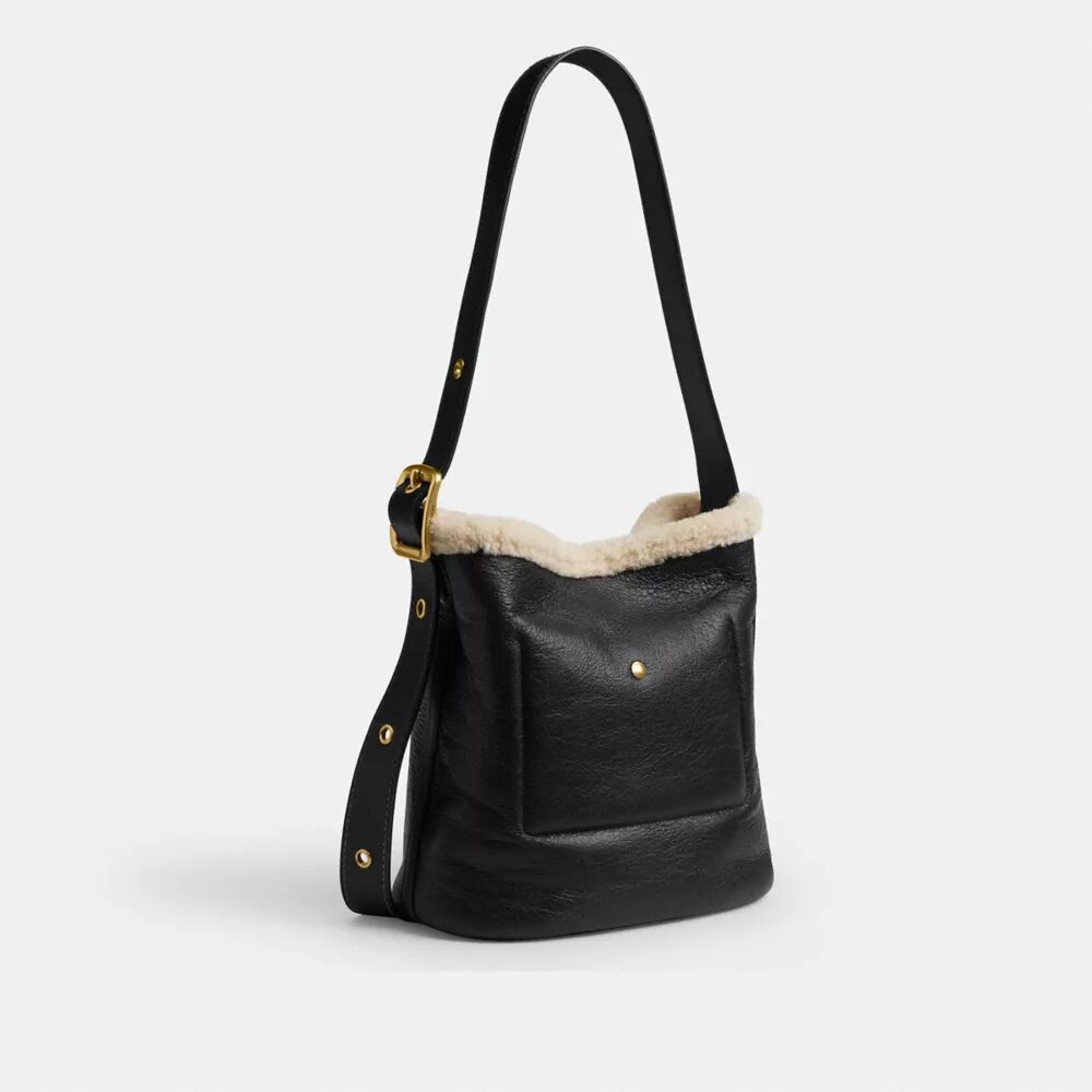 Bleecker-bucketveske i shearling