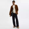 Bleecker-bucketveske i shearling