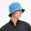 Bucket-hatt i denim med brodert Coach-skrift