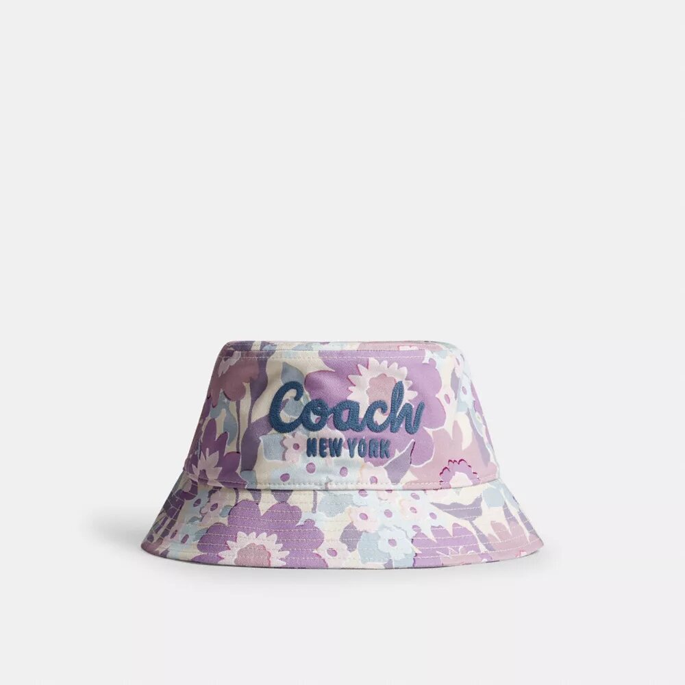 Bucket-hatt med Coach-skrift og blomstertrykk