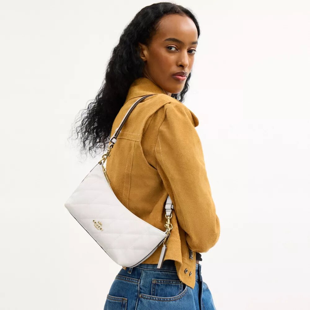 Caitlin skulderveske med vattering og anheng