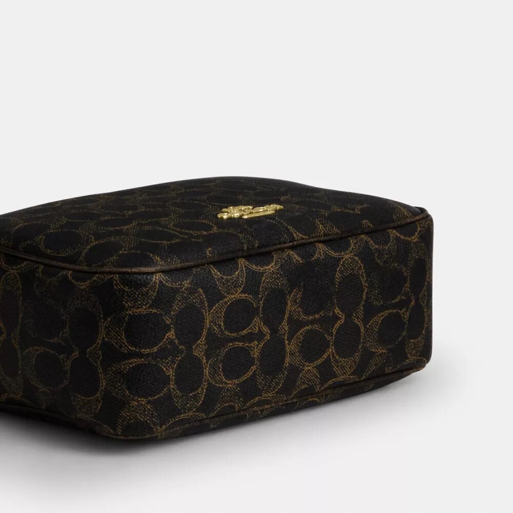 Carey-crossbody-veske i «Loved»-Signature Canvas med anheng