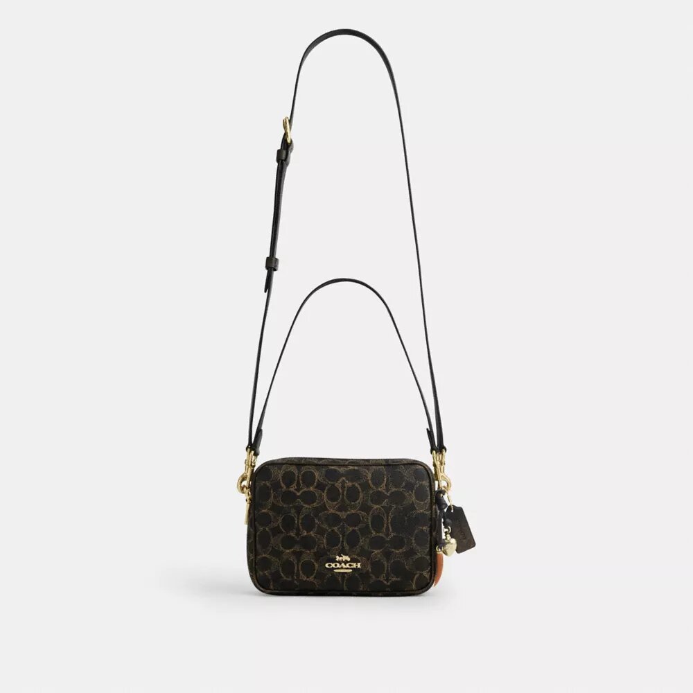 Carey-crossbody-veske i «Loved»-Signature Canvas med anheng