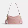 Carey-crossbody-veske i signaturdenim