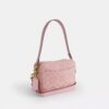 Carey-crossbody-veske i signaturdenim