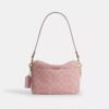 Carey-crossbody-veske i signaturdenim