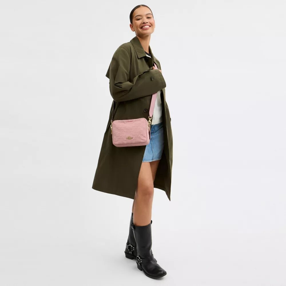 Carey-crossbody-veske i signaturdenim