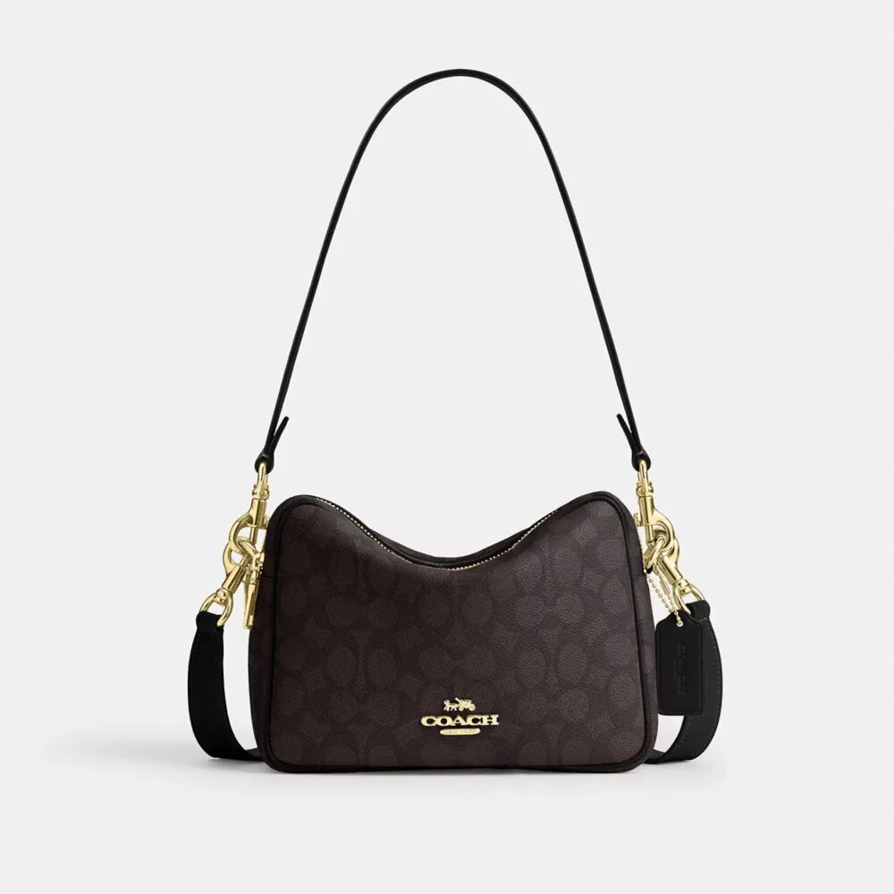Carey-crossbody-veske i Signature Canvas