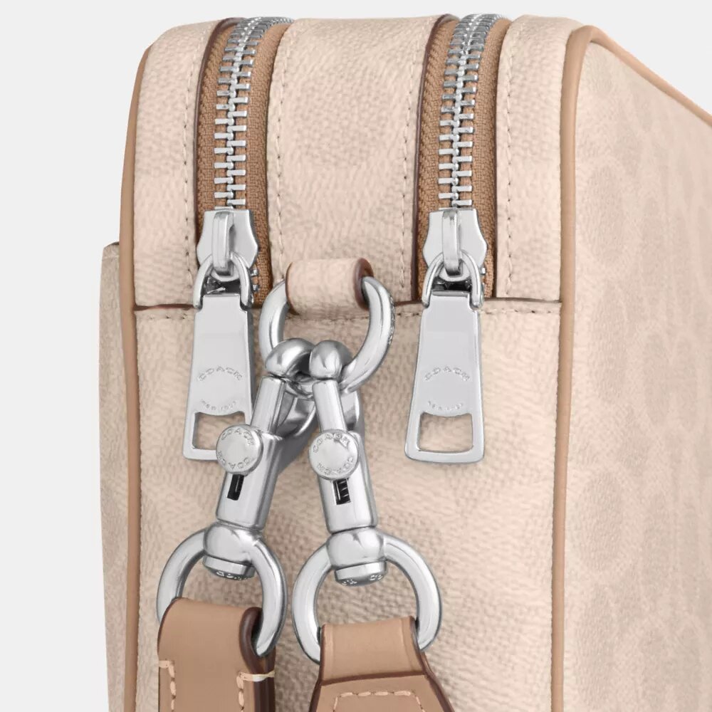 Carey-crossbody-veske i Signature Canvas