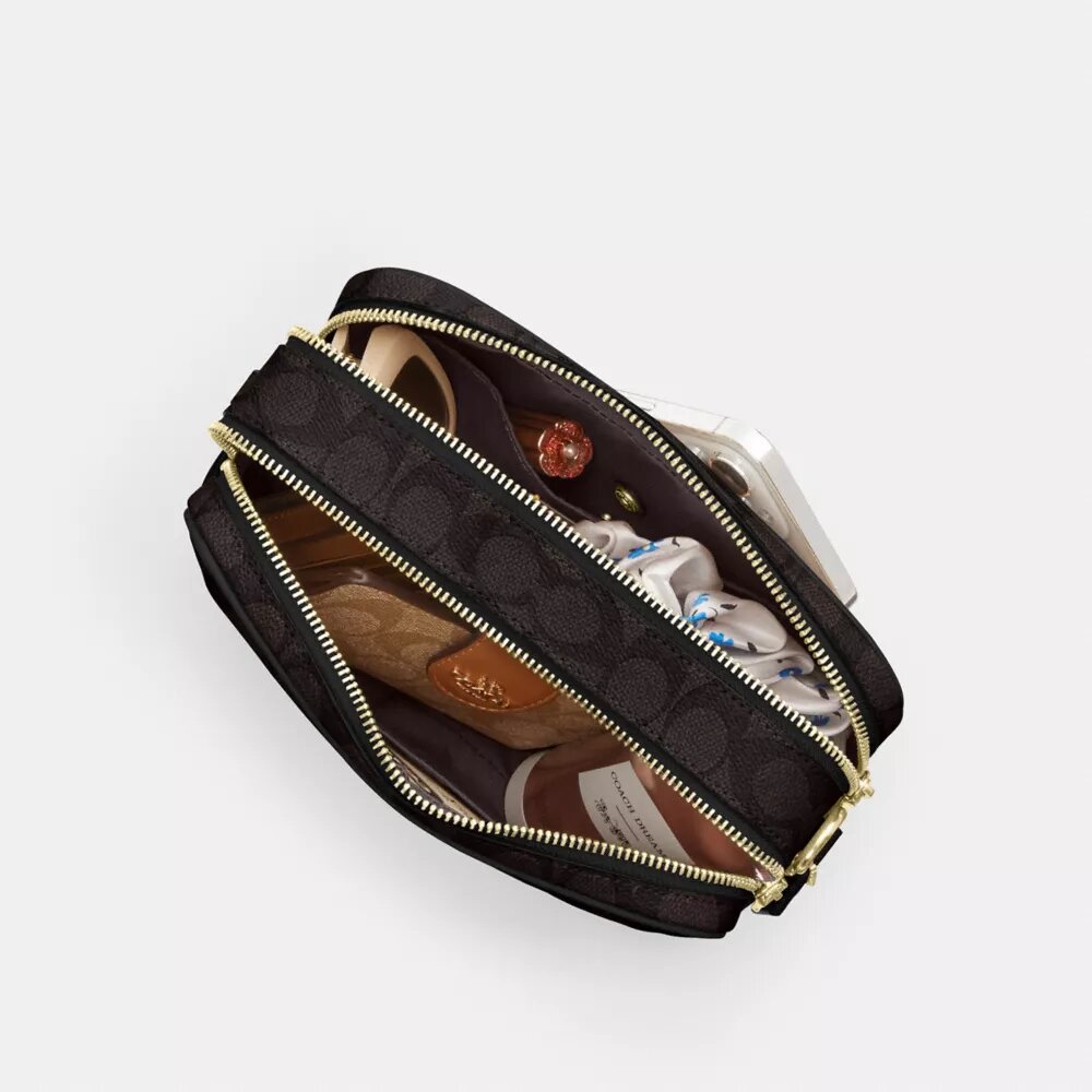 Carey-crossbody-veske i Signature Canvas