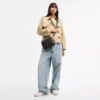 Carey-crossbody-veske i Signature Canvas