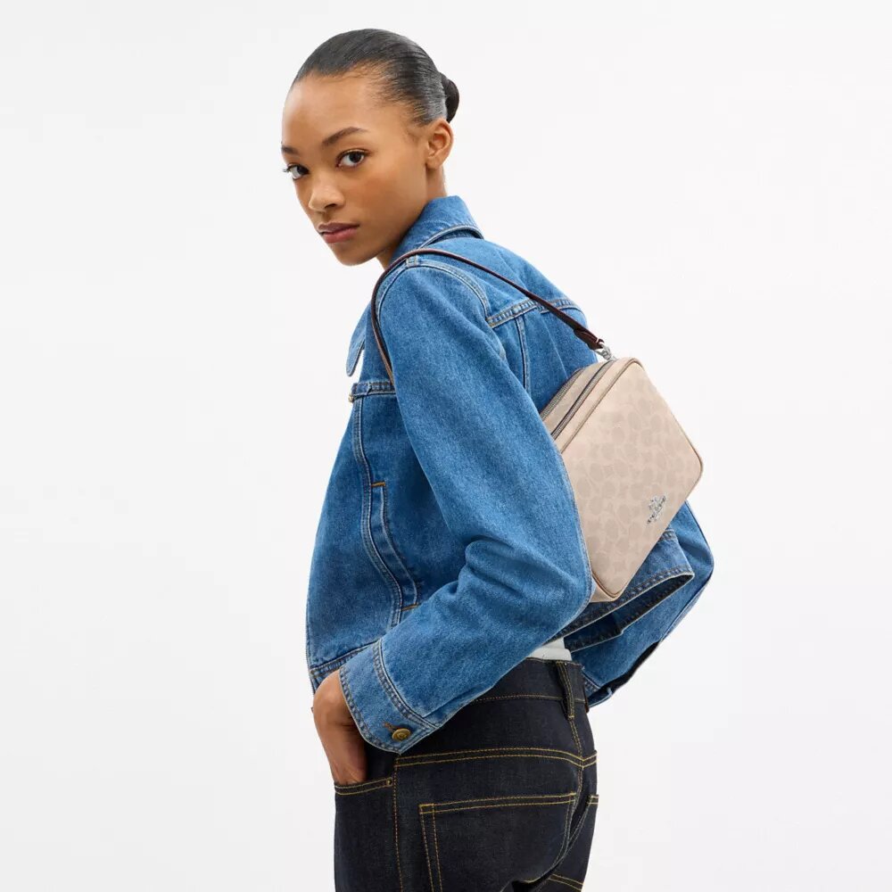 Carey-crossbody-veske i Signature Canvas