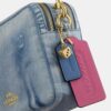 Carey-veske med kryssrem i «Loved Denim» med anheng