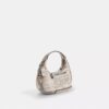 Carmen Mini-crossbody-veske med avisprint