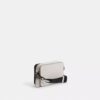 Charter Slim-crossbody-veske i Signature Canvas
