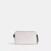 Charter Slim-crossbody-veske i Signature Canvas