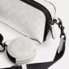 Charter Slim-crossbody-veske i Signature Canvas