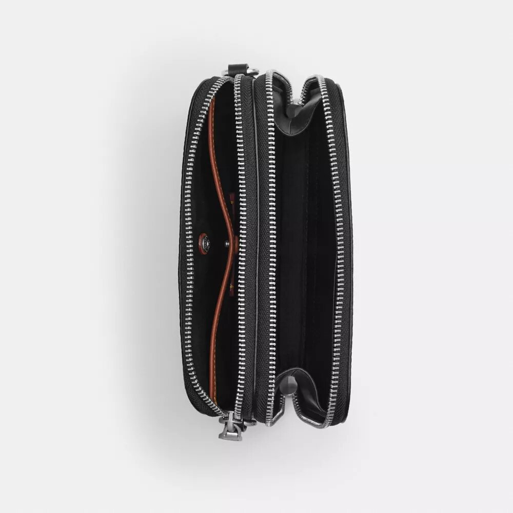 Clinton-crossbody-veske i Signature Canvas