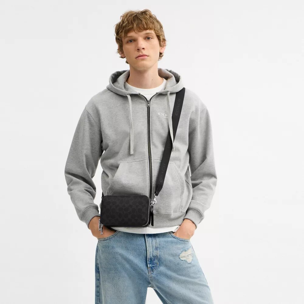 Clinton-crossbody-veske i Signature Canvas