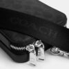 Clinton-crossbody-veske i Signature Canvas
