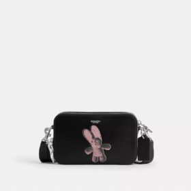 Clinton-crossbody-veske med grafisk motiv