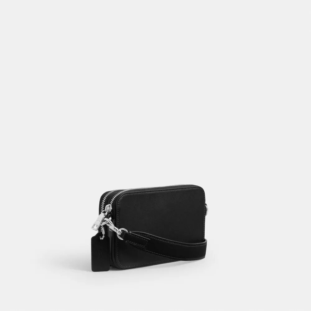 Clinton-crossbody-veske med grafisk motiv
