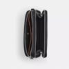 Clinton-crossbody-veske med grafisk motiv