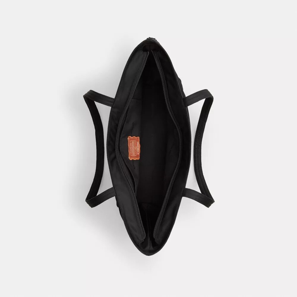 Coachtopia Loop Bow-veske