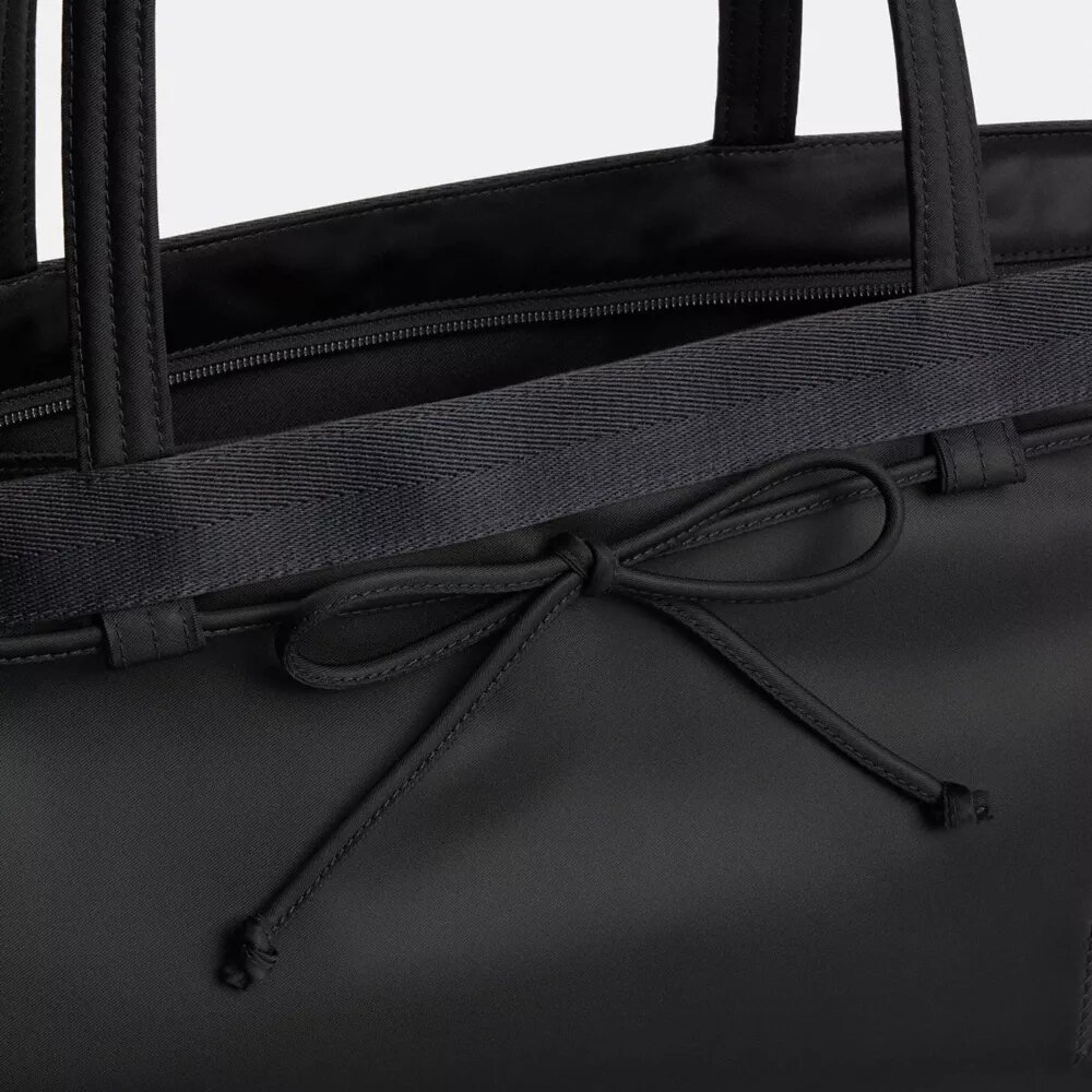Coachtopia Loop Bow-veske
