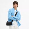 Colton Crossbody Bag 19 i Signature Canvas