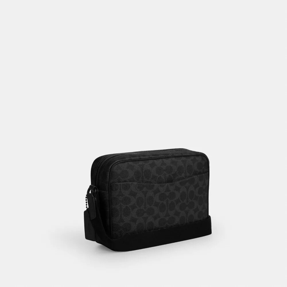 Colton Crossbody Bag 25 i Signature Canvas