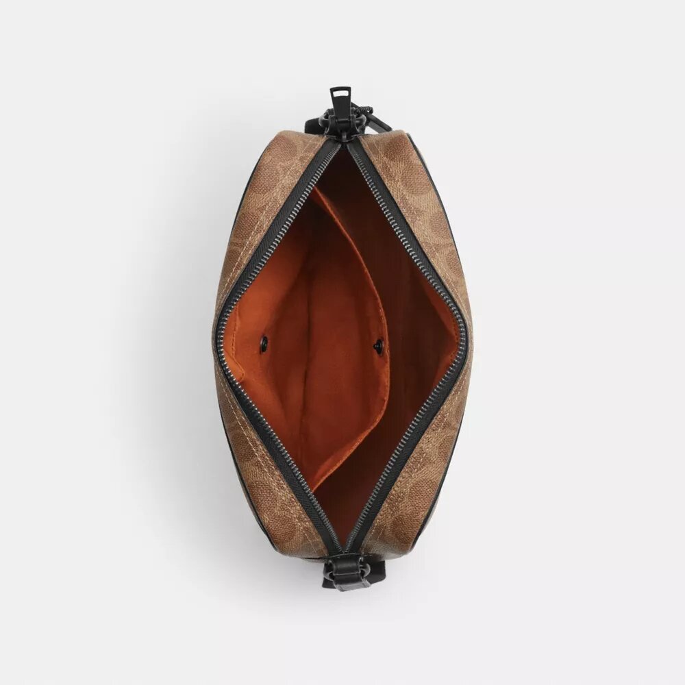Colton Crossbody Bag 25 i Signature Canvas