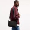 Colton Crossbody Bag 25 i Signature Canvas