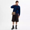 Colton Crossbody Bag 25 i Signature Canvas