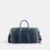 Compass Bag 35 i regenerativ bomullsdenim med anheng