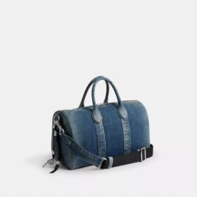 Compass Bag 35 i regenerativ bomullsdenim med anheng