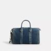 Compass Bag 35 i regenerativ bomullsdenim med anheng