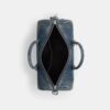Compass Bag 35 i regenerativ bomullsdenim med anheng