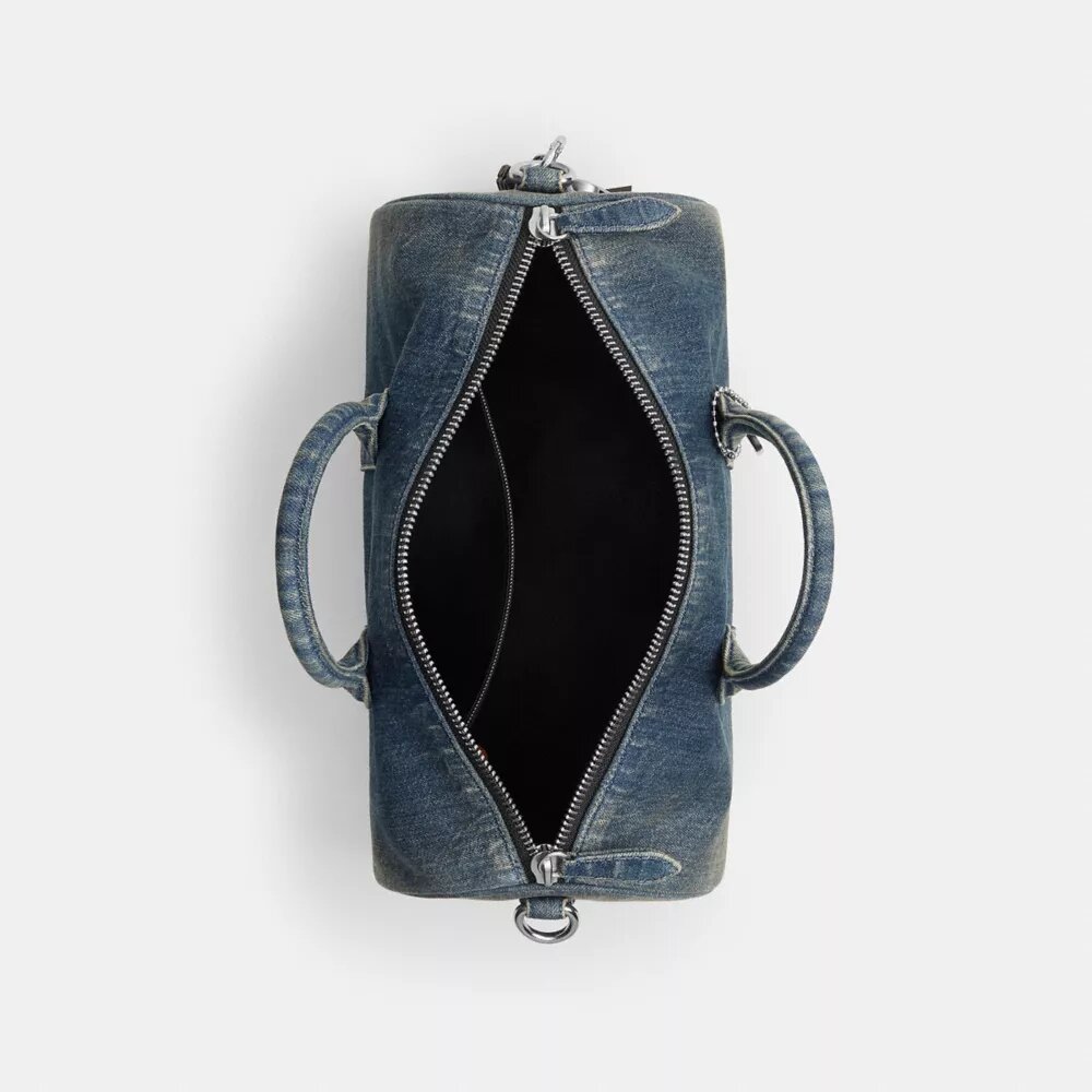 Compass Bag 35 i regenerativ bomullsdenim med anheng