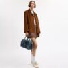 Compass Bag 35 i regenerativ bomullsdenim med anheng