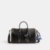 Compass Bag 35 i slitt skinn med anheng