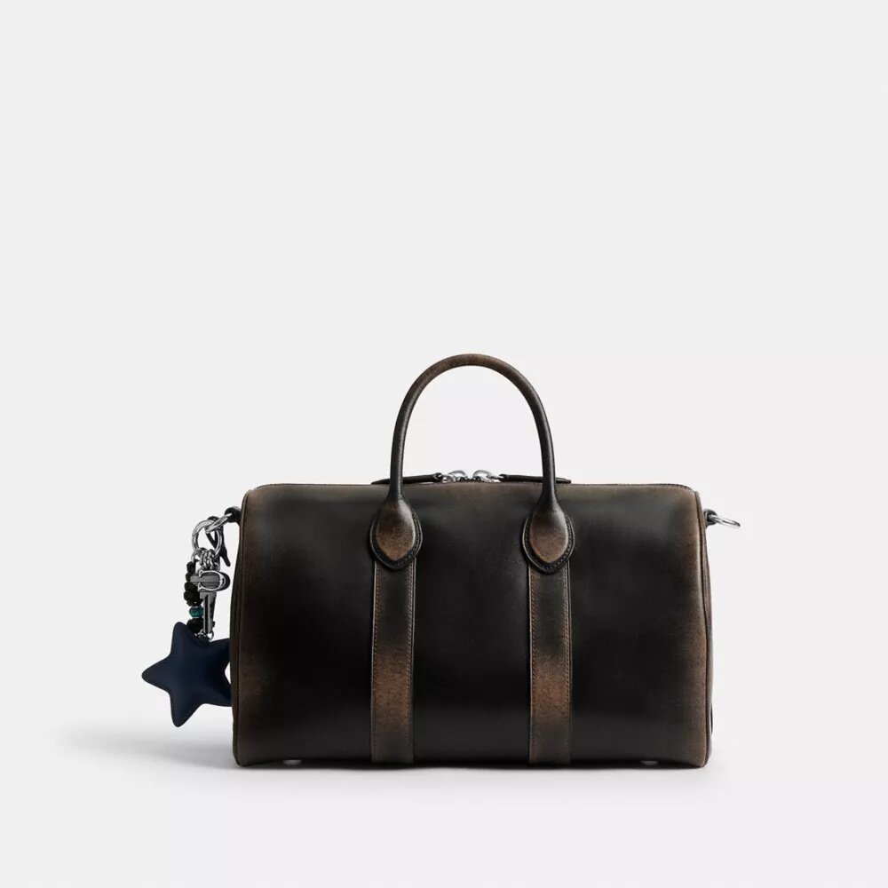 Compass Bag 35 i slitt skinn med anheng