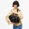 Compass Bag 35 i slitt skinn med anheng
