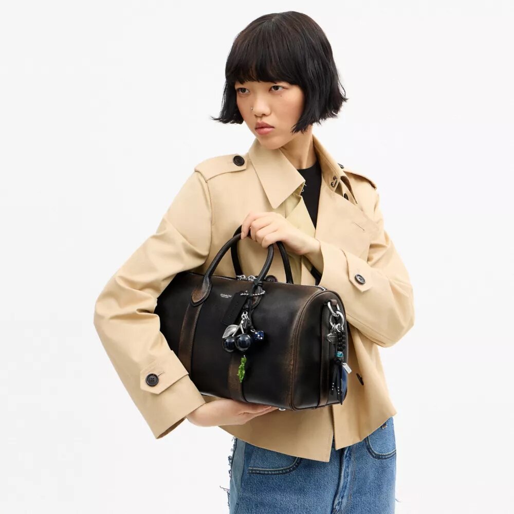 Compass Bag 35 i slitt skinn med anheng