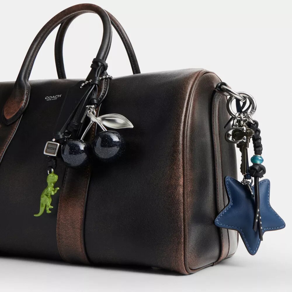 Compass Bag 35 i slitt skinn med anheng